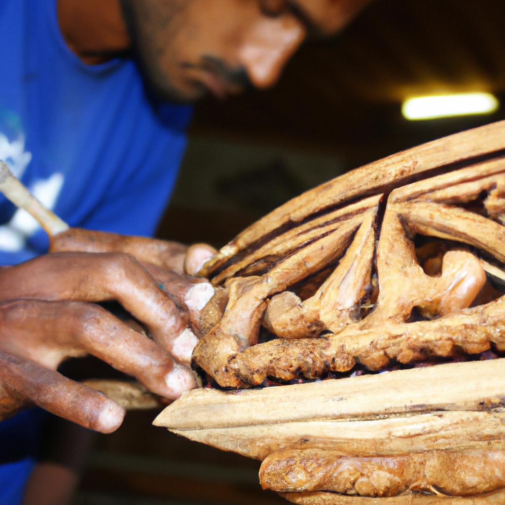 Person carving intricate wooden design