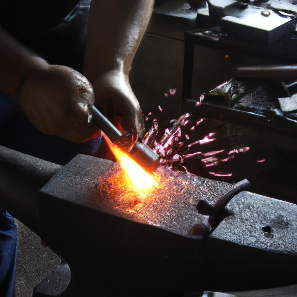 Person hammering hot metal piece